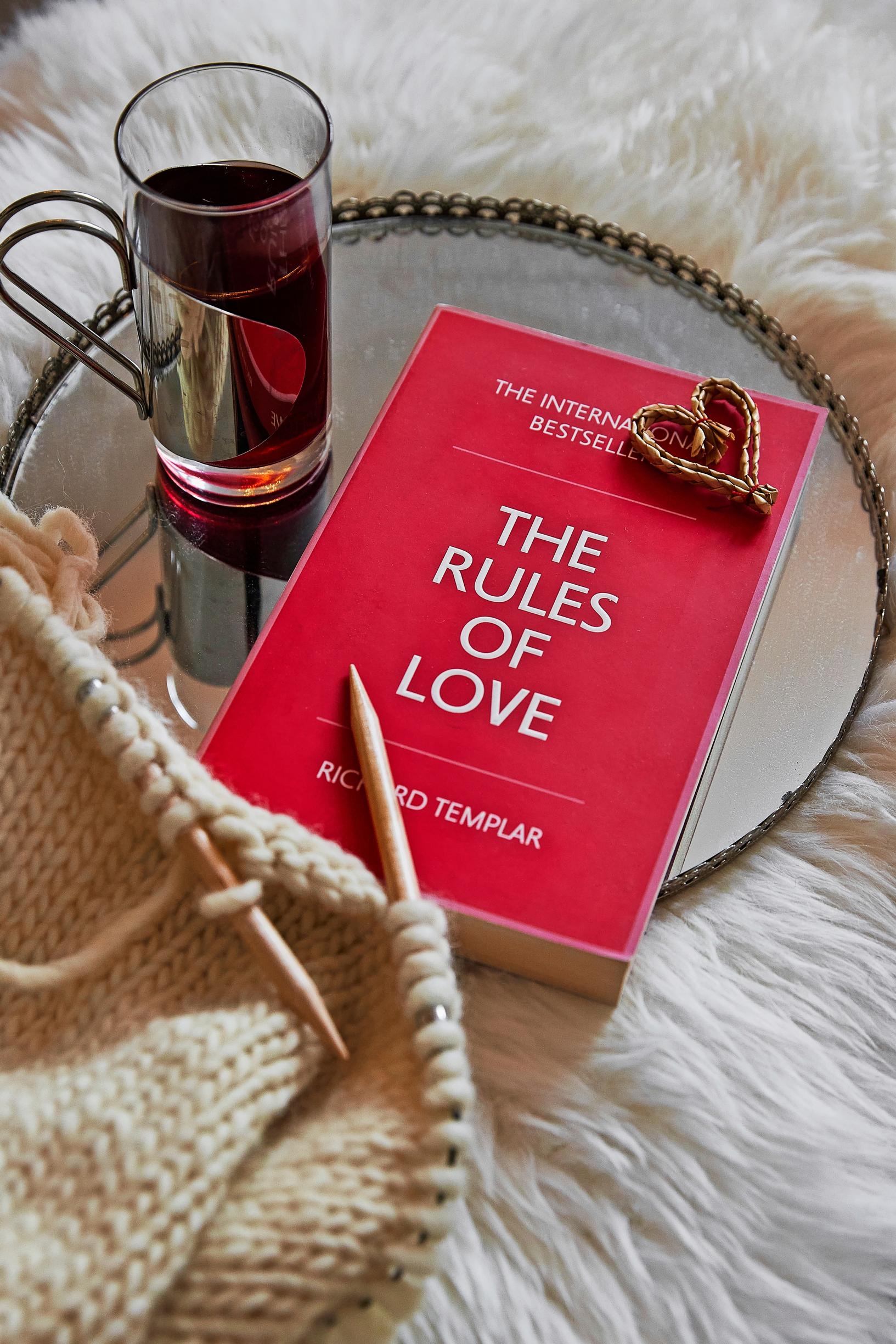 Book and knitting on a tray