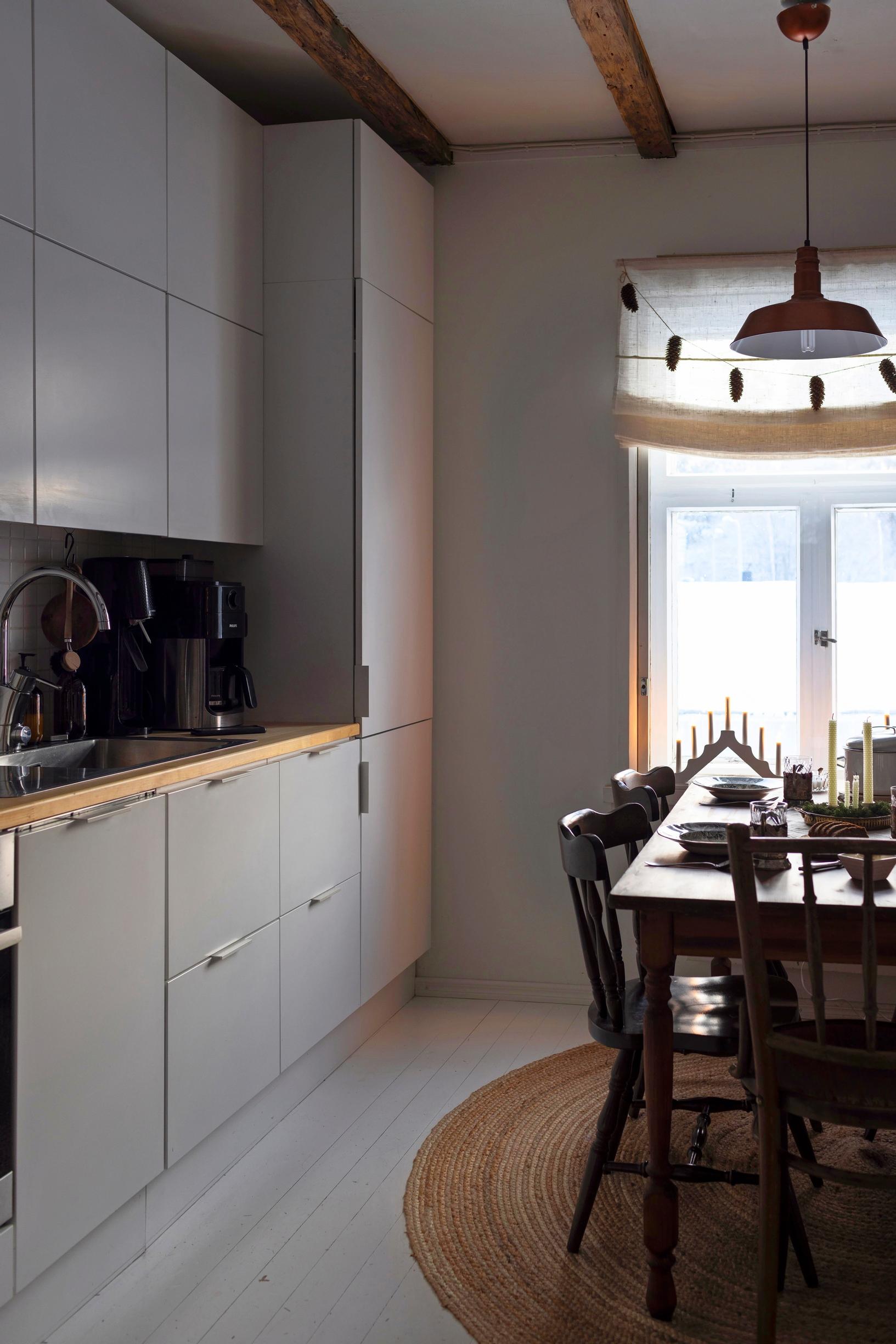 A gray kitchen and dining table