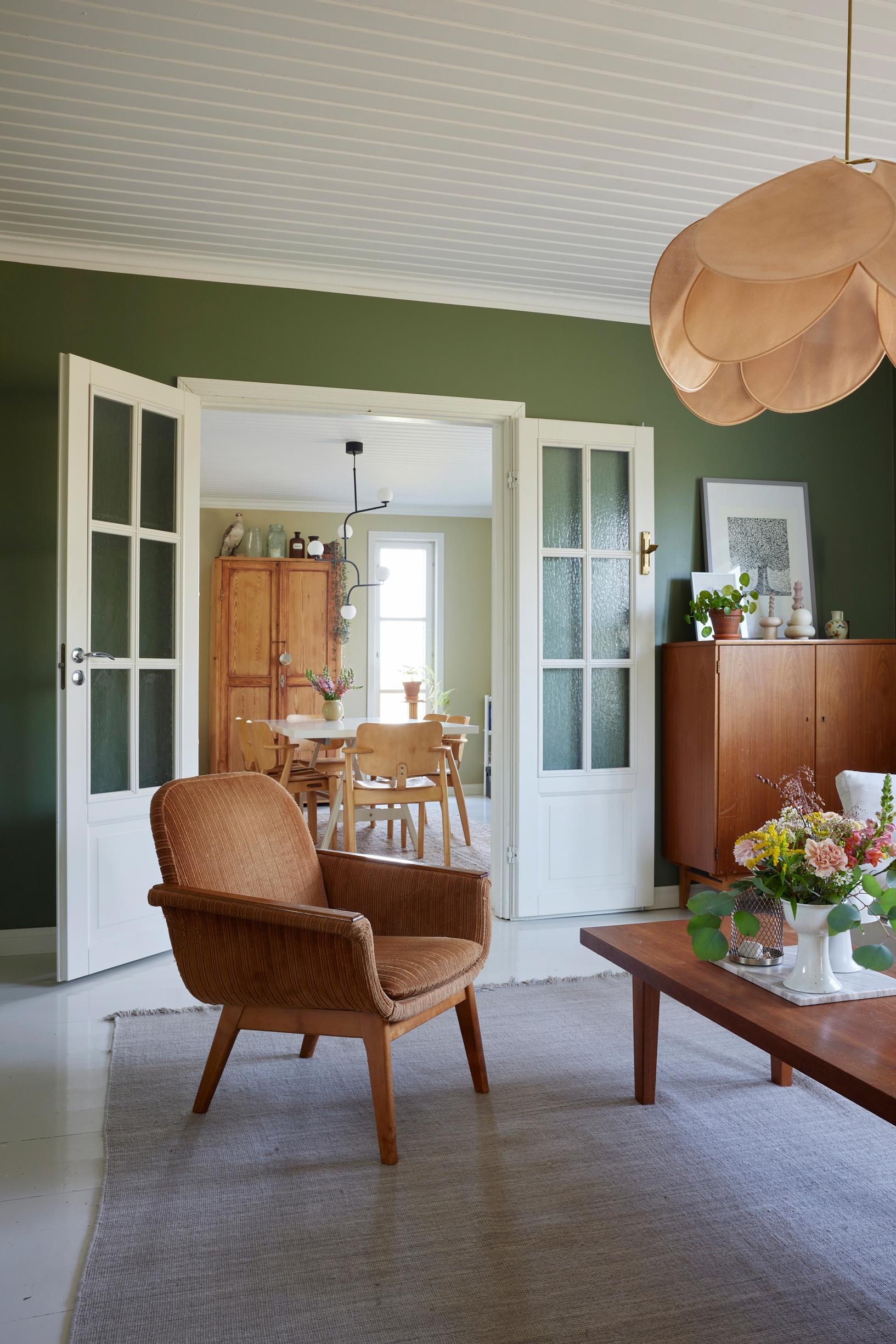 Double doors between the living room and dining area