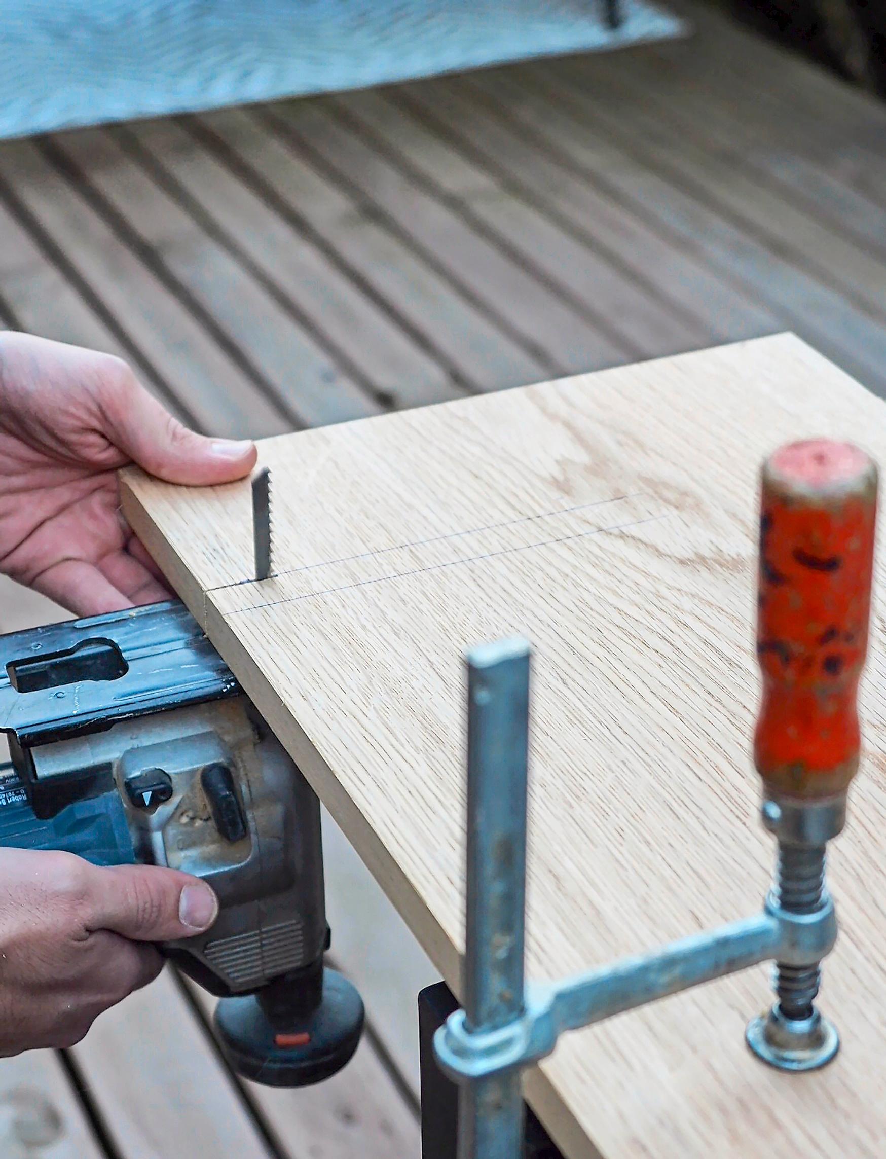 Notching the vertical boards for the shelf joints.