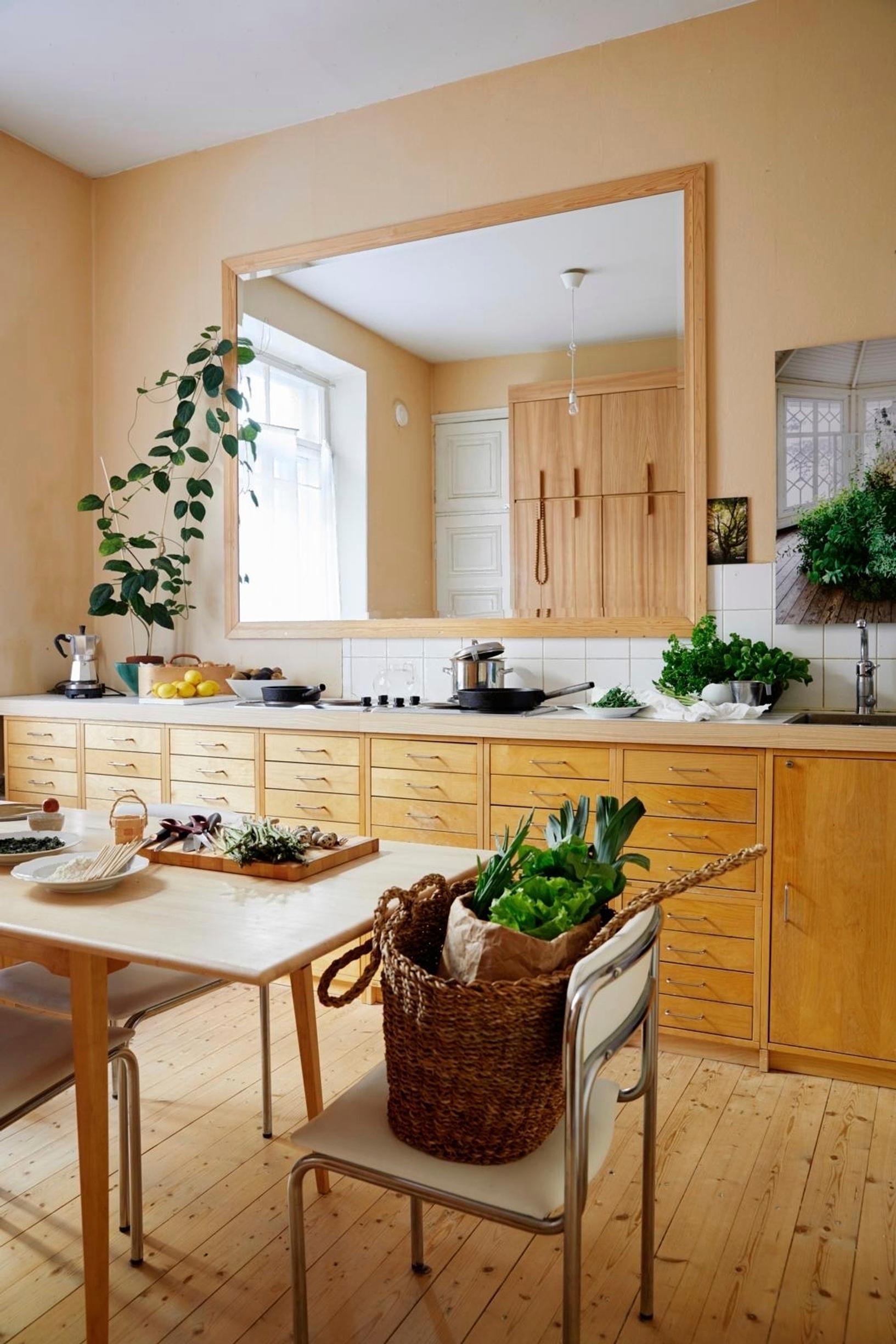 A kitchen cabinet built by repurposing wooden office furniture.