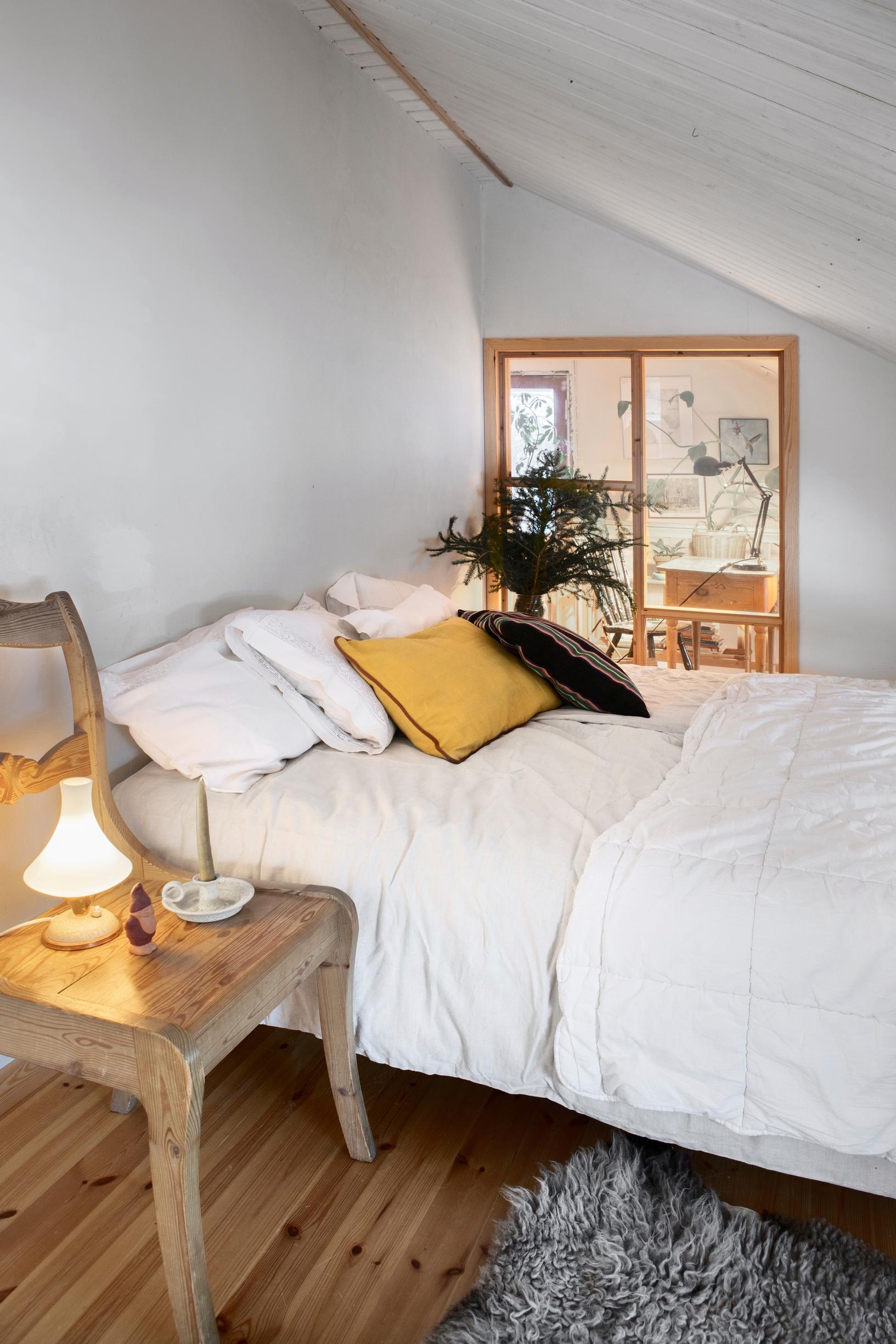 bedroom with a small interior window