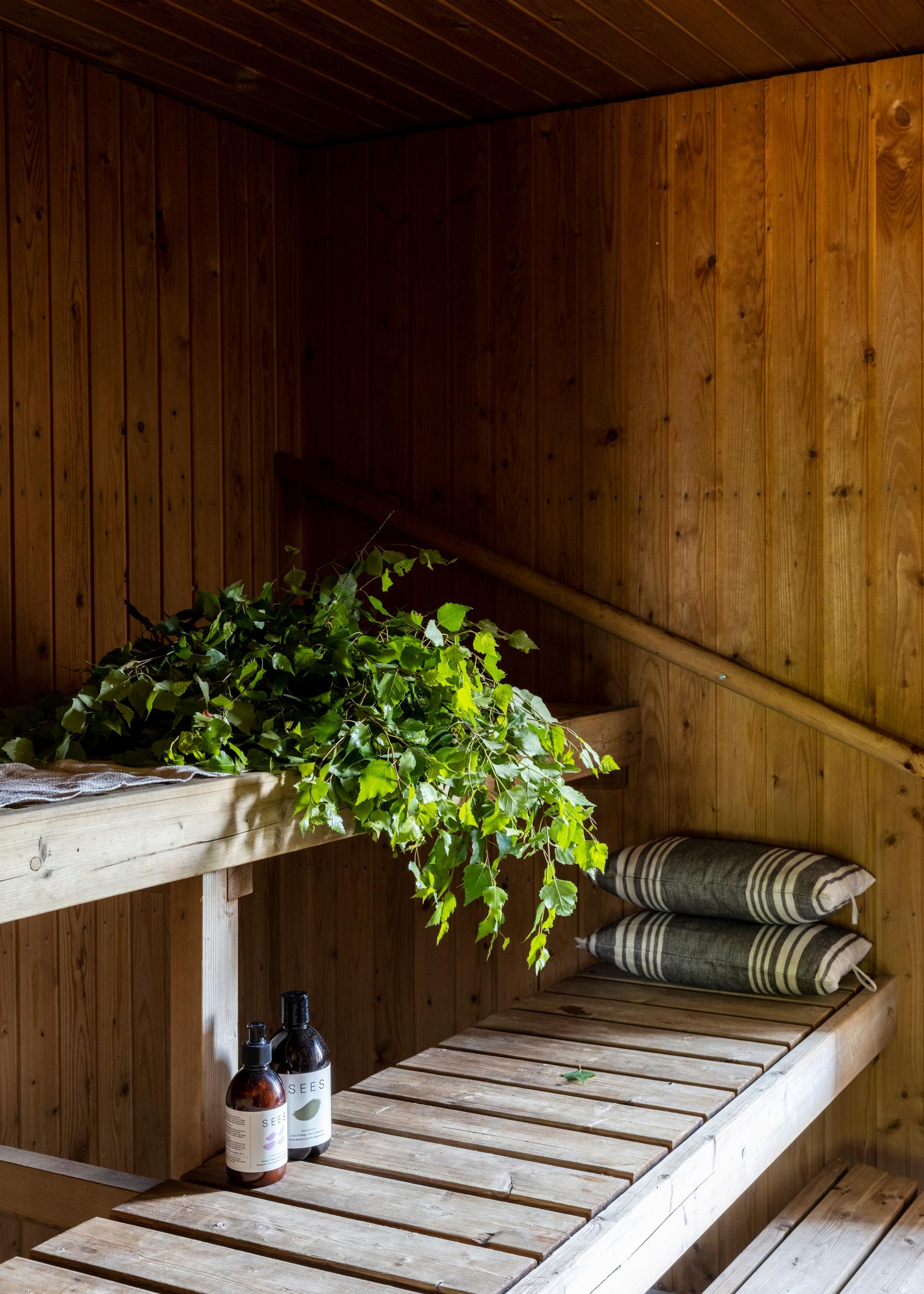 A sauna whisk on the benches