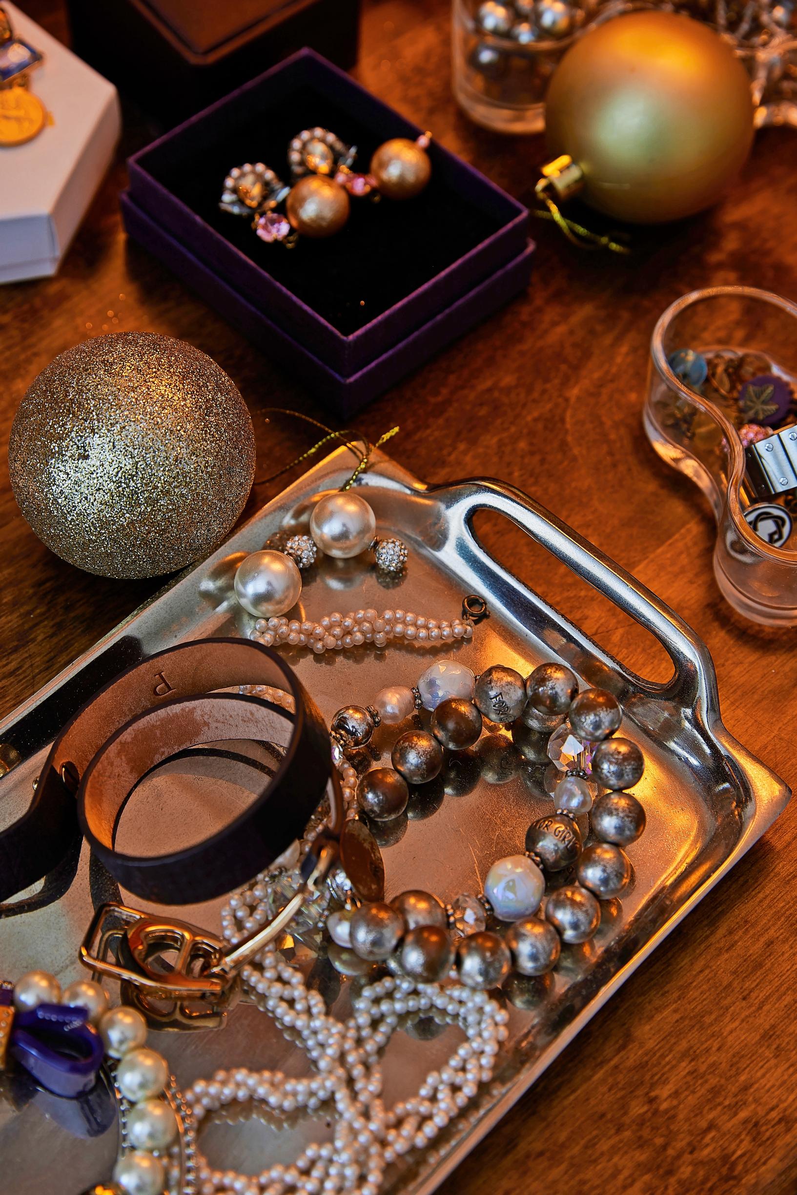 Jewelry on a tray atop the dresser