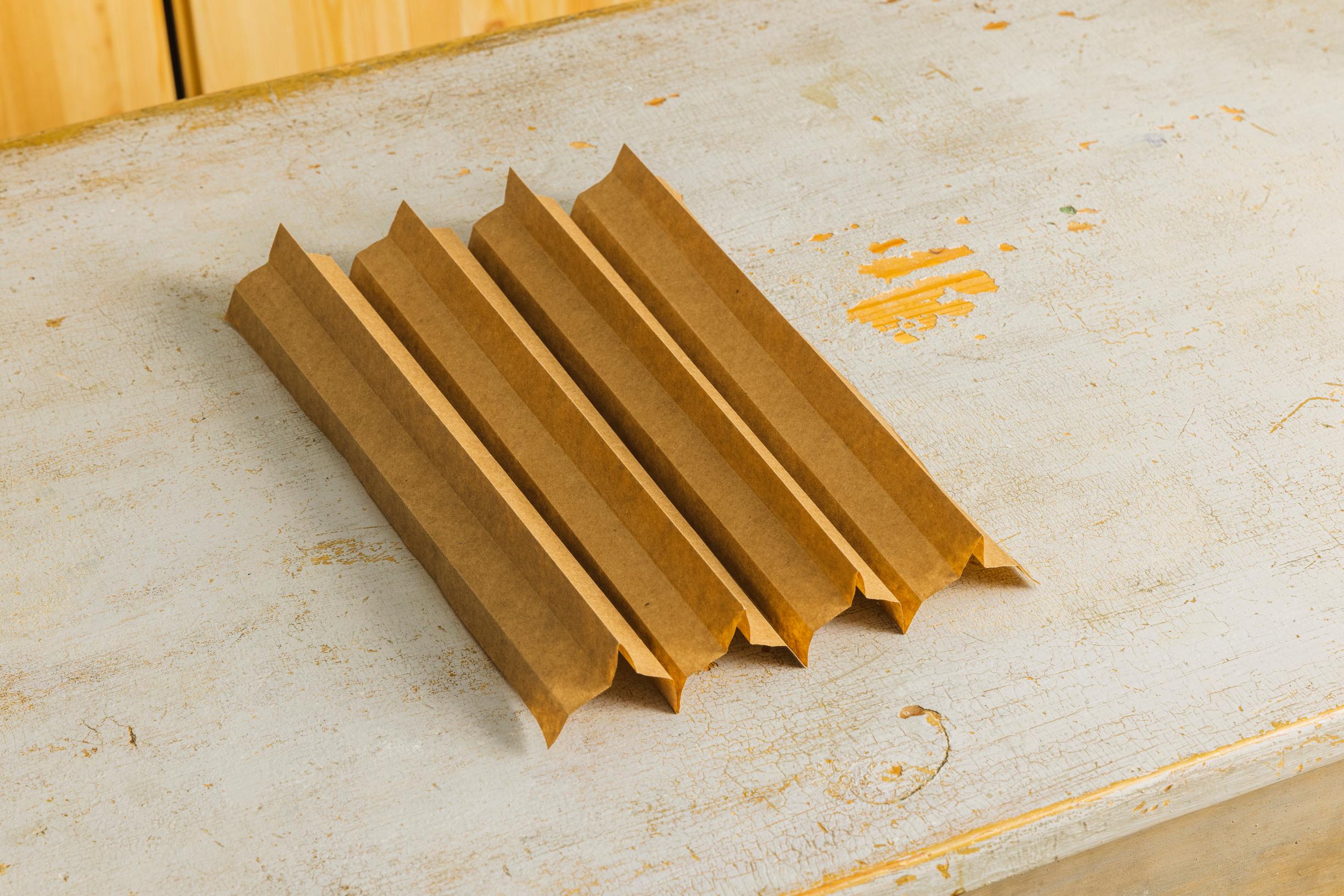 Layered star step 3: the paper is refolded into a wide accordion.