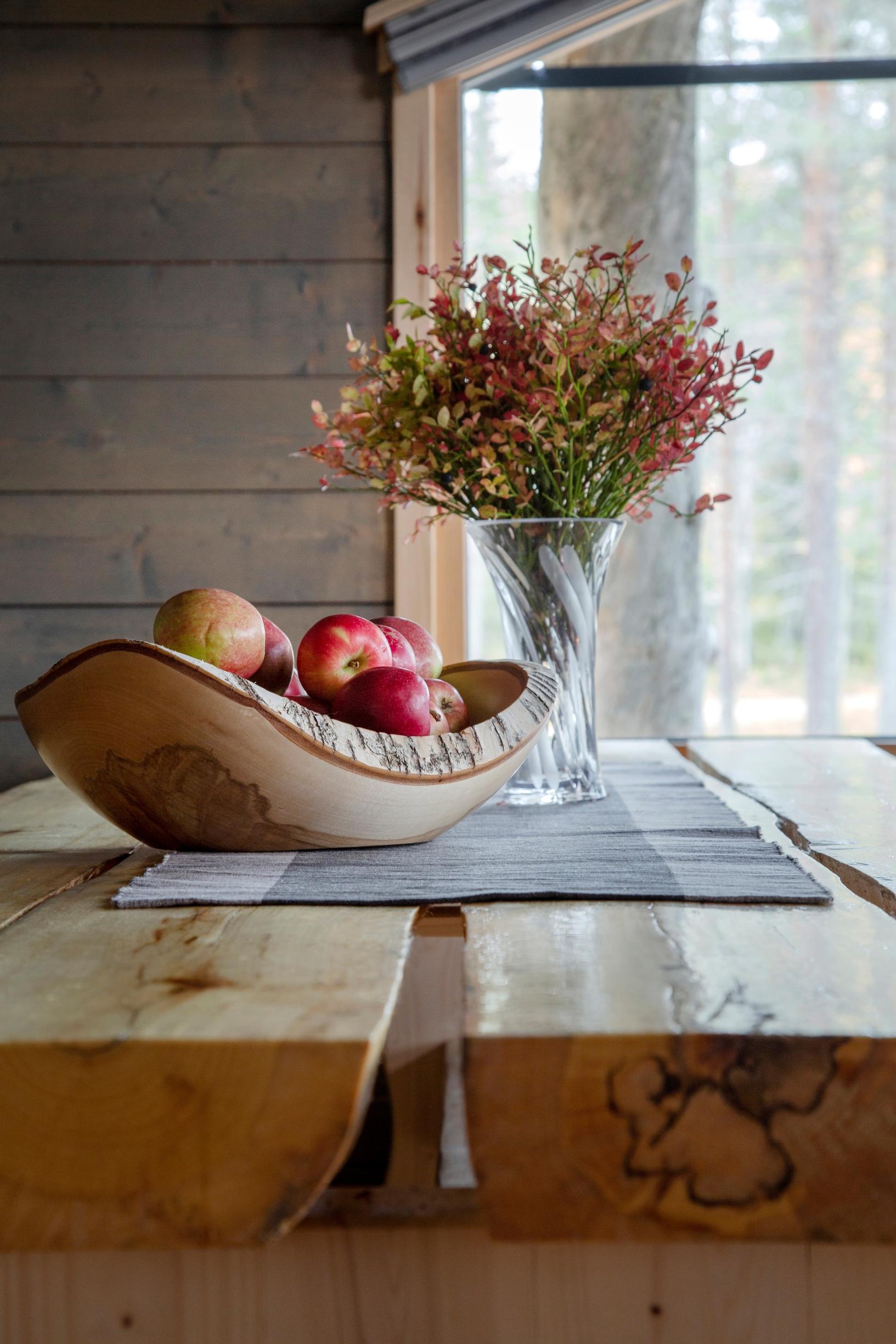 Apples on a plank table