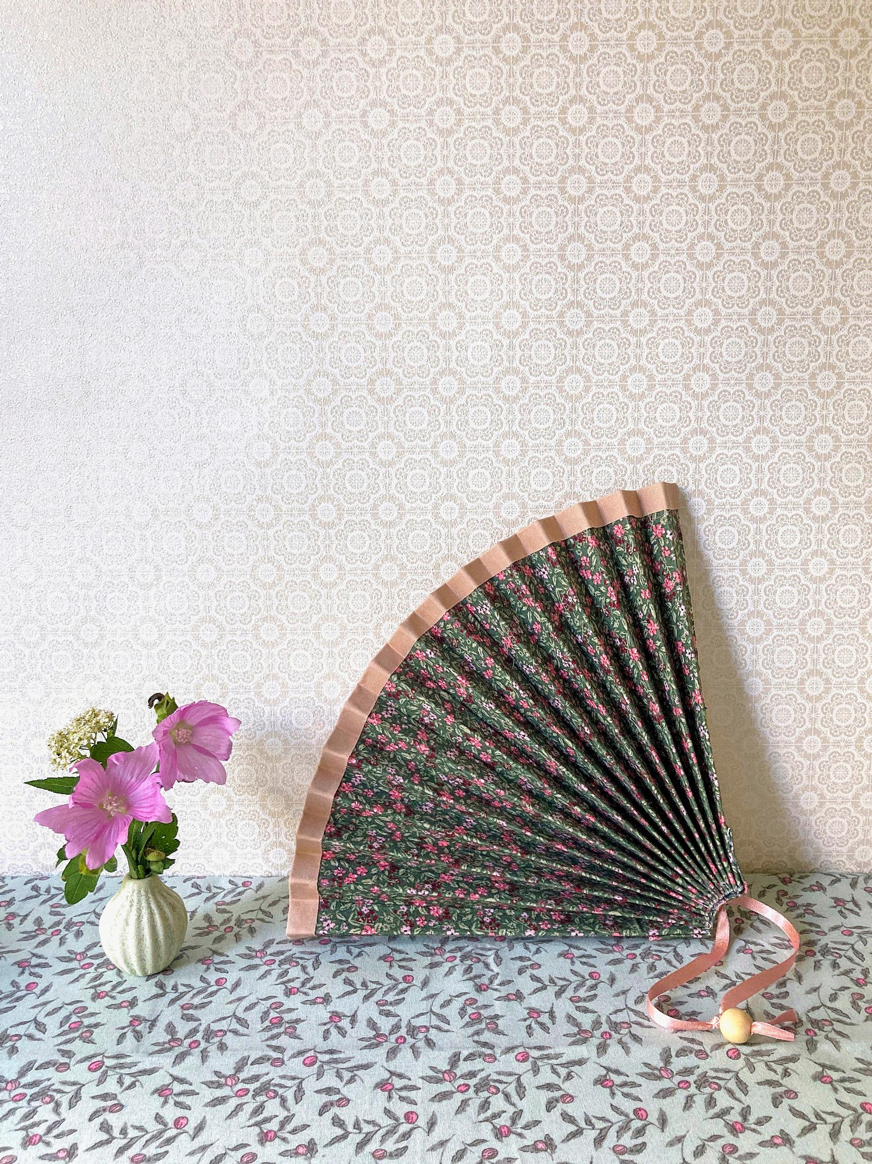 Ordinary cardboard and floral fabric make a stunning fan—see our easy tutorial