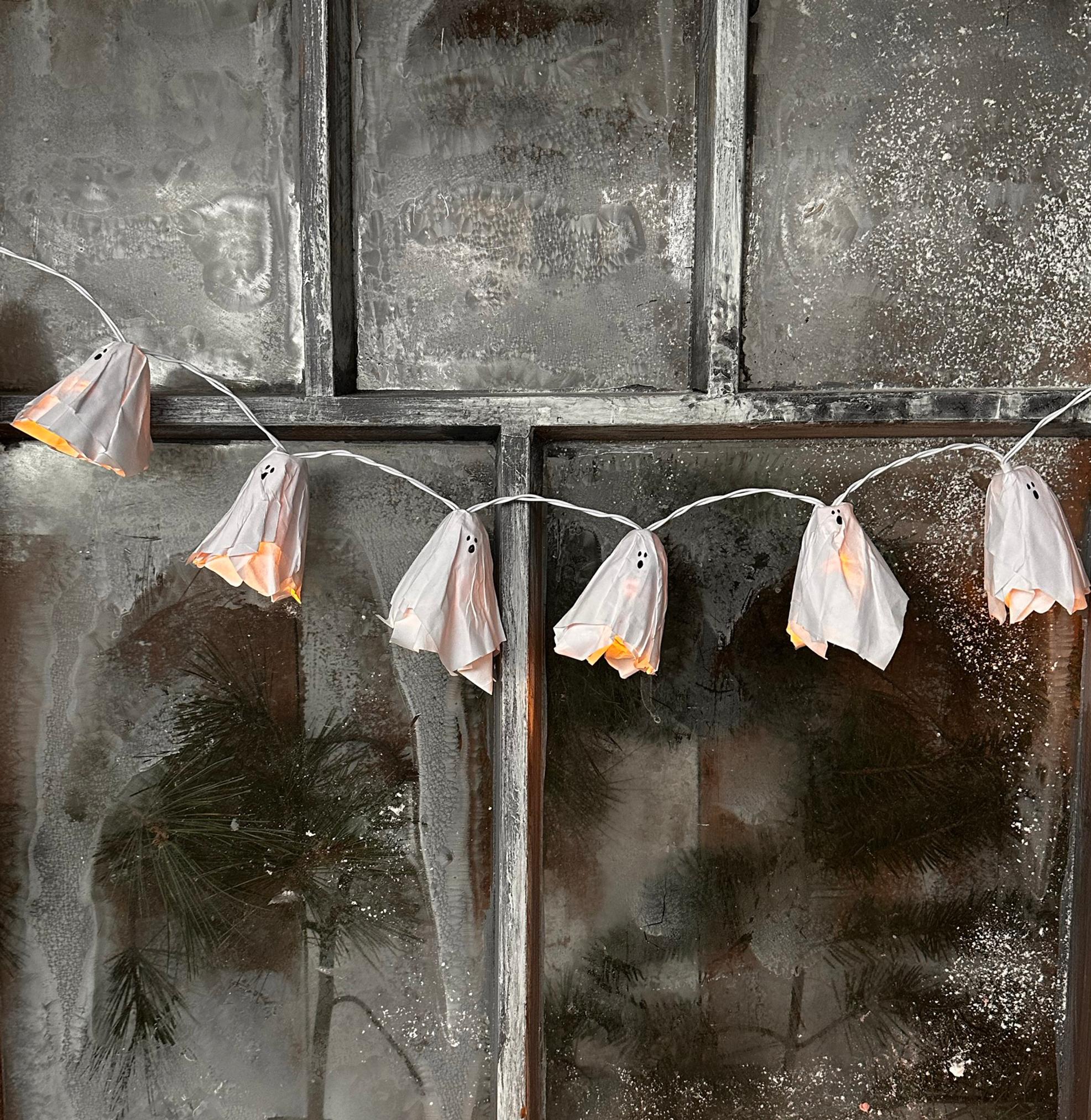 Spook up Halloween with ghost lights: easy paper ghosts for a sweetly eerie glow