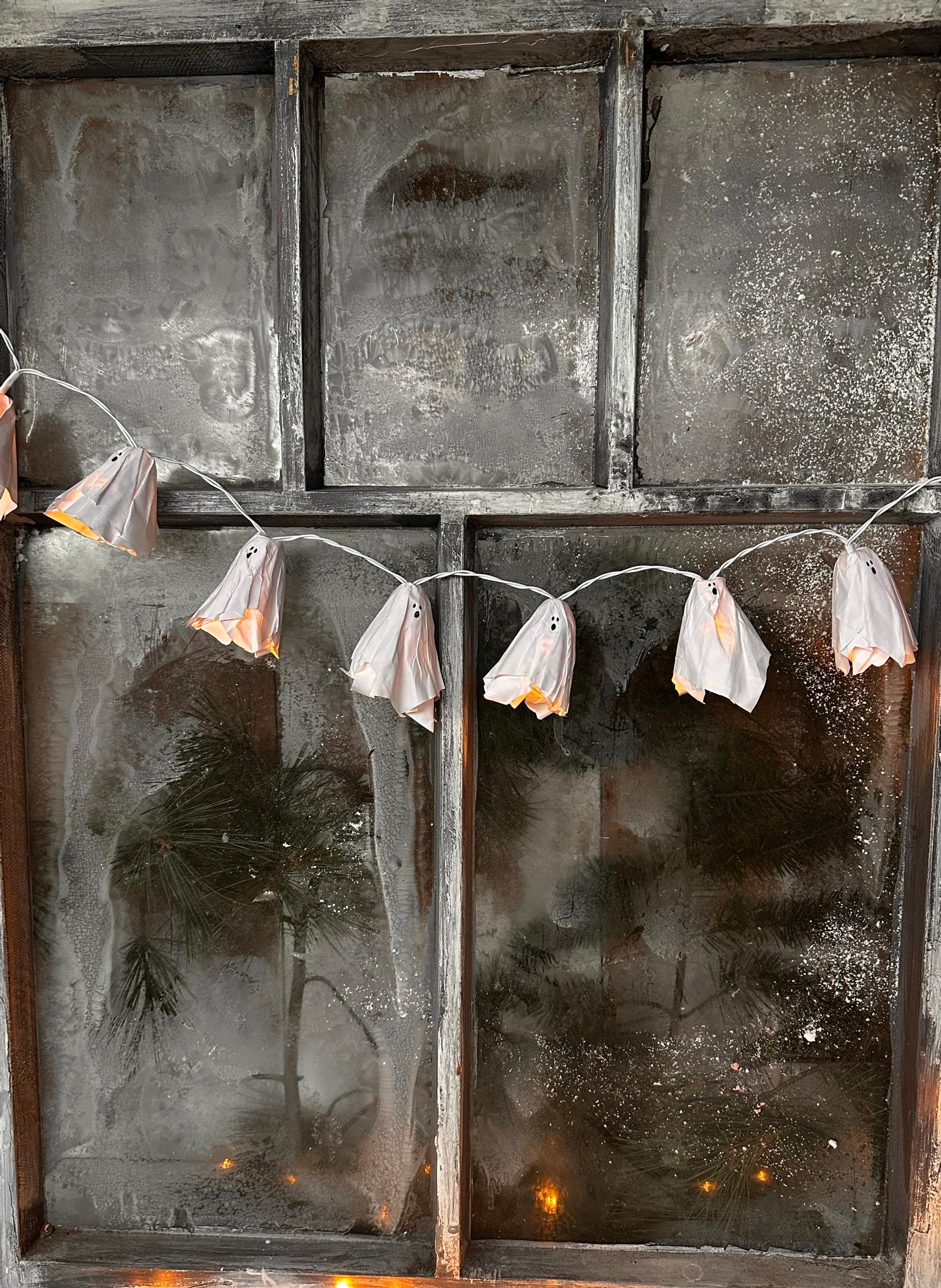 Spook up Halloween with ghost lights: easy paper ghosts for a sweetly eerie glow