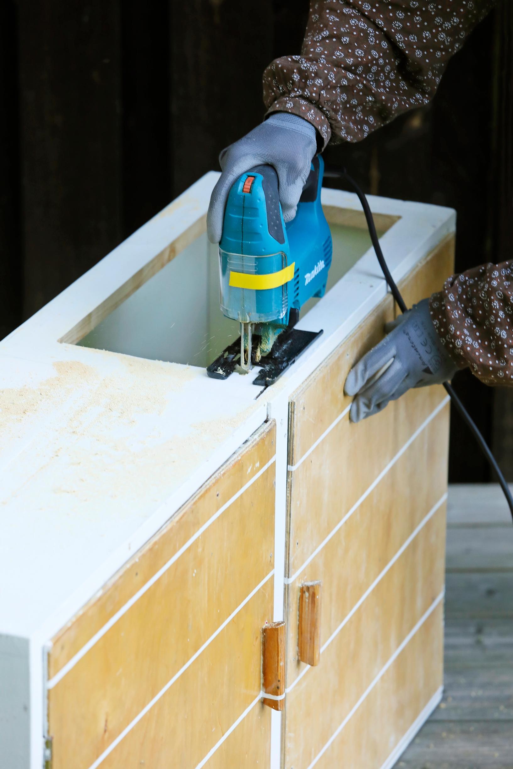 Cutting an opening for the dish-drying rack